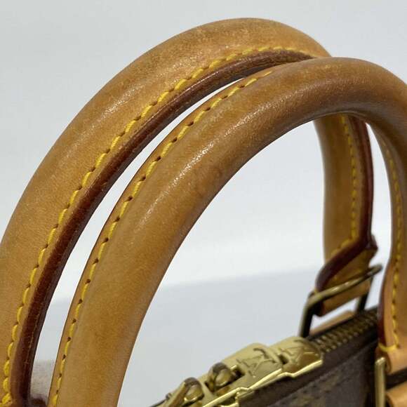 LOUIS VUITTON Brown Monogram Alma Bag